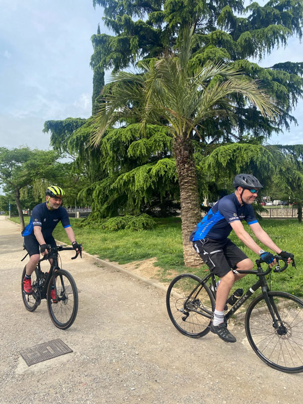 Andrew and Jason on their bikes, on a remarkably flat path