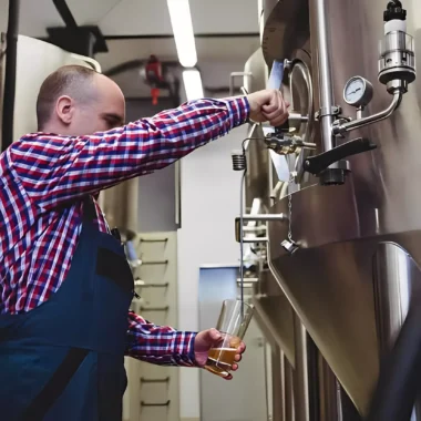 Chadlington Brewery tour group in the brewhouse